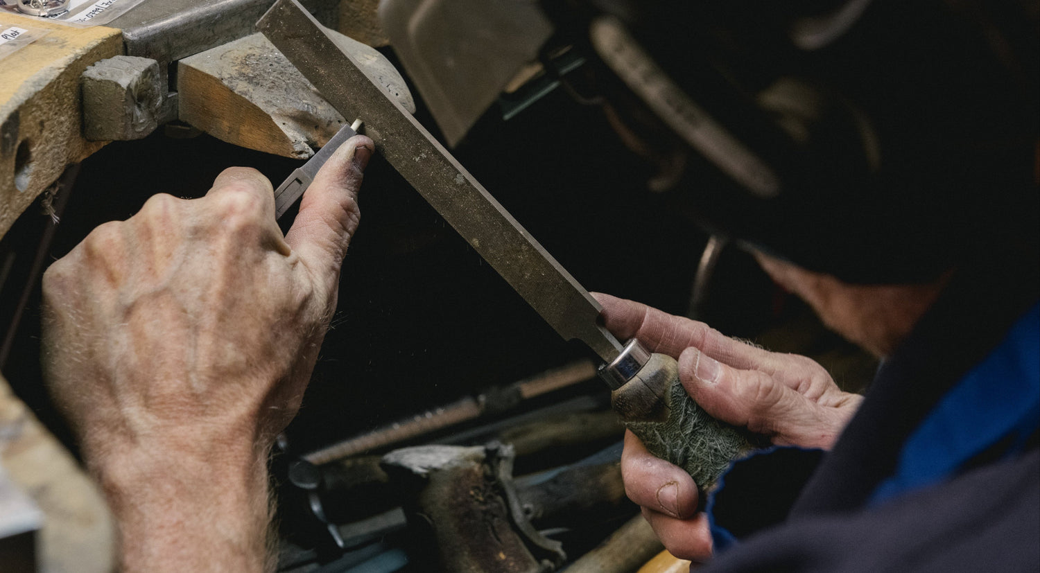 Goldsmith making a ring